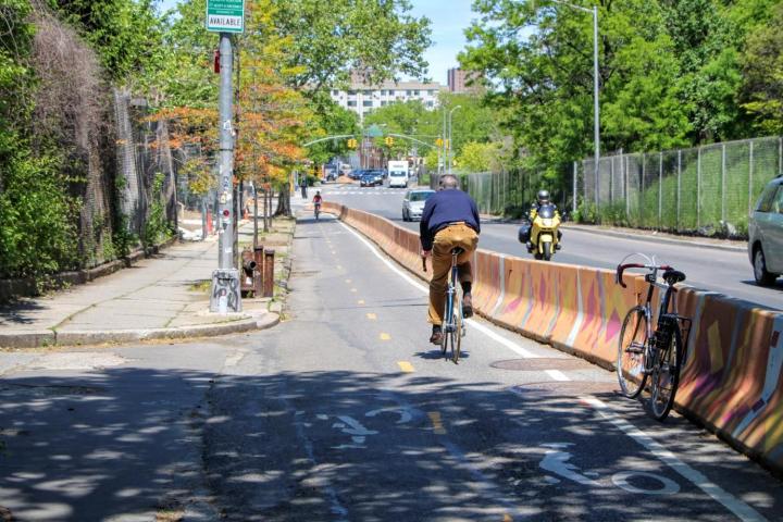 biker on bike path in the daytime