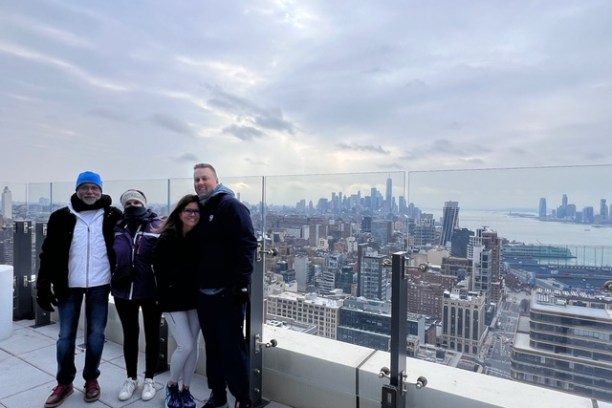 a group of people standing in front of a building