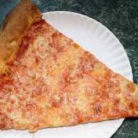Large slice of cheese pizza on a white paper plate.