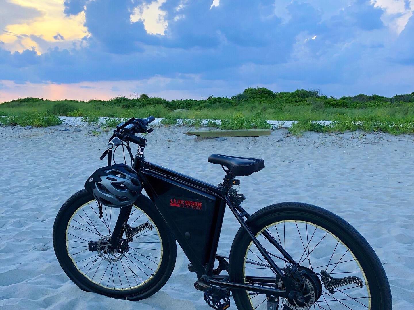 a bicycle is parked next to a body of water