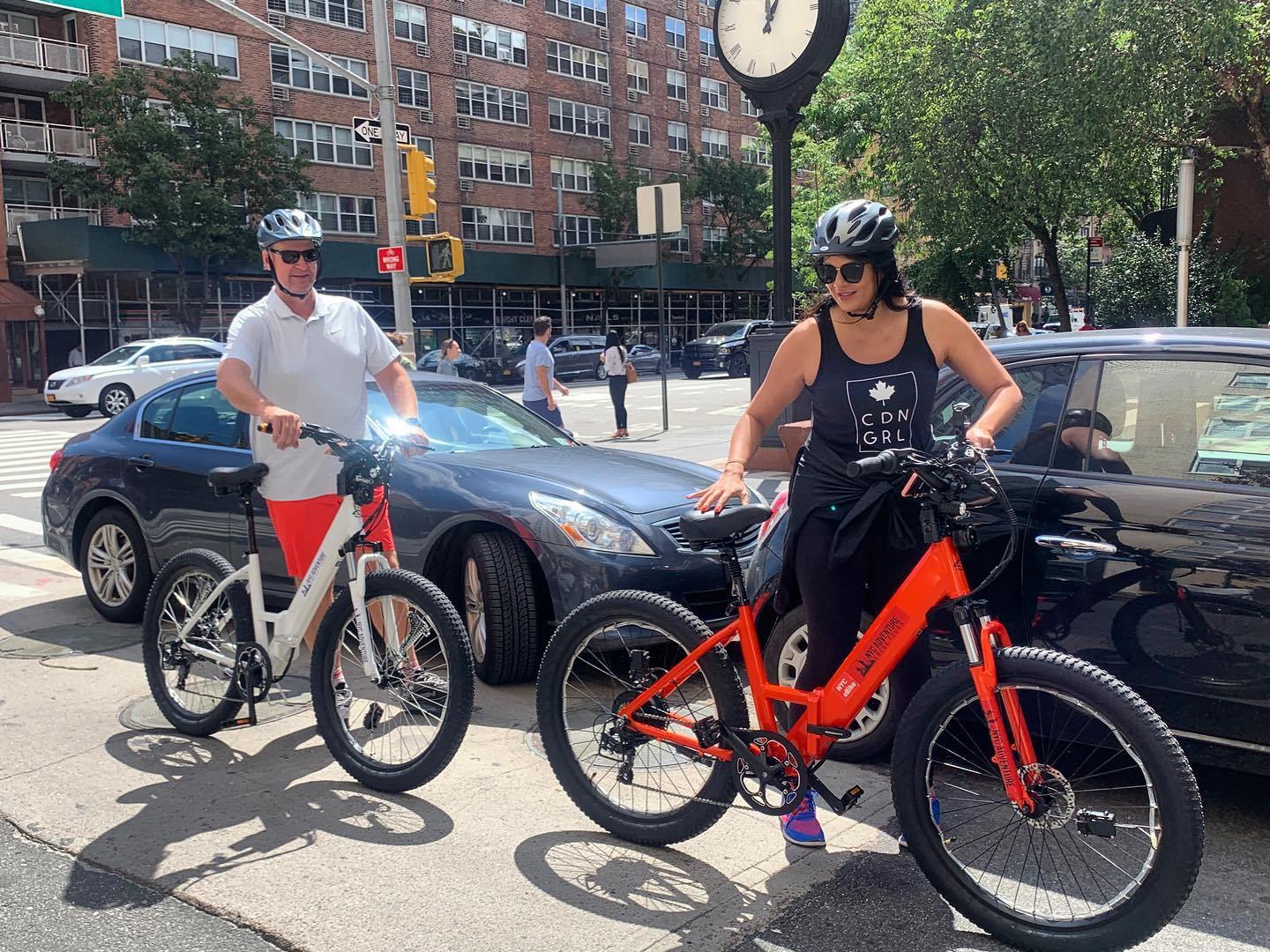 a person standing next to a bicycle