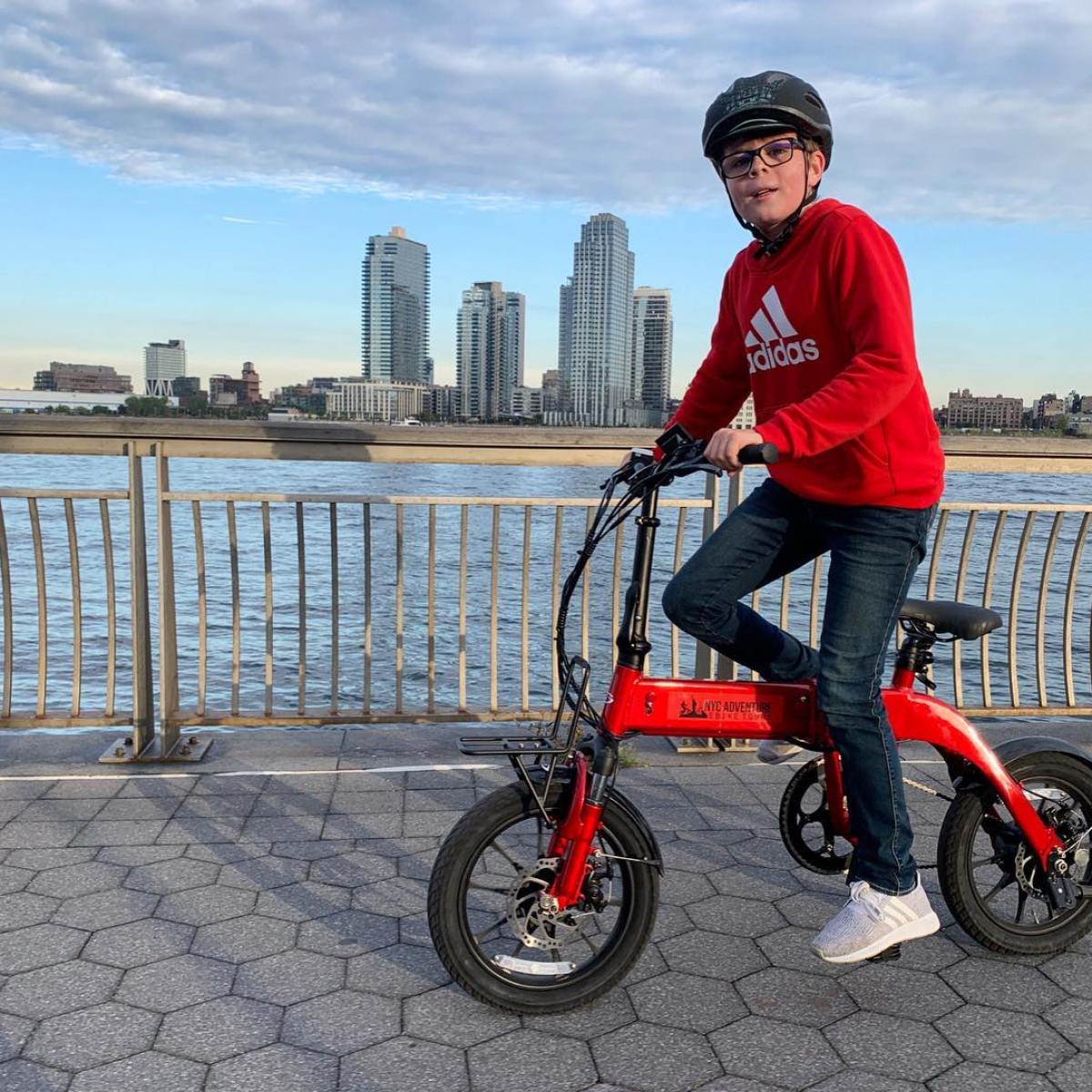 a man riding on the back of a bicycle